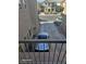 Balcony view of parking in front of surrounding homes at 5651 Bettors Luck Ct, Las Vegas, NV 89122