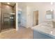 Bright primary bathroom with a shower and double sink vanity at 5735 Oak Bend Dr, Las Vegas, NV 89135