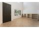 Inviting entryway with high ceilings, a dark front door, built in shelves, and plenty of natural light at 5735 Oak Bend Dr, Las Vegas, NV 89135