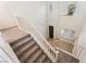 Bright view of the staircase highlighting the open layout and natural light from multiple windows at 5735 Oak Bend Dr, Las Vegas, NV 89135