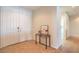 Bright entryway showcasing tile flooring, double doors, and a decorative console table with accents at 5889 Wildhorse Ledge Ave, Las Vegas, NV 89131