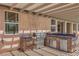 Outdoor kitchen area with stainless steel gas grill and built in counter and cabinets at 5889 Wildhorse Ledge Ave, Las Vegas, NV 89131