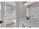 Traditional bathroom features a white vanity, tile floor and a shower-tub combo at 632 Hitchen Post Dr, Henderson, NV 89011