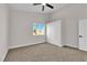 Bedroom featuring neutral carpet, ceiling fan, and a closet at 632 Hitchen Post Dr, Henderson, NV 89011