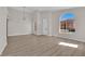 Spacious living room with high ceilings, modern lighting, and large arched windows at 632 Hitchen Post Dr, Henderson, NV 89011