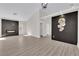 Modern living room with new flooring, fireplace, and accent walls at 632 Hitchen Post Dr, Henderson, NV 89011