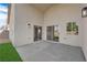 Private covered patio area with concrete flooring and access to the yard at 632 Hitchen Post Dr, Henderson, NV 89011