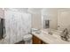 Full bathroom features a single sink vanity and a shower and tub combination at 6713 Guidestar St, North Las Vegas, NV 89084