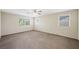 Bedroom featuring plush carpeting and lots of light from multiple windows at 6713 Guidestar St, North Las Vegas, NV 89084