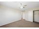 Bedroom featuring a ceiling fan, closet, and neutral-toned walls at 6713 Guidestar St, North Las Vegas, NV 89084