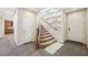 Foyer featuring tile flooring and staircase to second story at 6713 Guidestar St, North Las Vegas, NV 89084