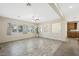 Bright living room with wood flooring and large windows for natural light at 6713 Guidestar St, North Las Vegas, NV 89084