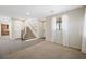 Cozy living room with a window view and staircase at 6713 Guidestar St, North Las Vegas, NV 89084