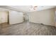 Open concept living room featuring sleek floors, recessed lighting, and seamless flow to kitchen at 6713 Guidestar St, North Las Vegas, NV 89084