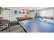 Spacious game room featuring a pool table, ping pong table, and vintage arcade game at 7026 Westpark Ct, Las Vegas, NV 89147