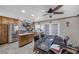 Charming kitchen with stainless steel appliances, tile backsplash, and a central island at 7026 Westpark Ct, Las Vegas, NV 89147