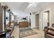 Spacious main bedroom with ample natural light, neutral color palette, and ensuite bathroom at 7026 Westpark Ct, Las Vegas, NV 89147