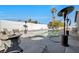 A beautiful backyard pool with a spa, patio furniture, heaters and a concrete deck are ready for entertaining and relaxation at 7026 Westpark Ct, Las Vegas, NV 89147