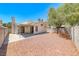 Large backyard features a covered patio with a block perimeter wall at 7212 Nordic Lights Dr, Las Vegas, NV 89119