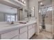 Bathroom with double sink vanity and shower-tub combination at 7212 Nordic Lights Dr, Las Vegas, NV 89119