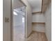 Walk-in closet with built-in shelving at 7212 Nordic Lights Dr, Las Vegas, NV 89119