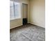 A cozy bedroom with a window and carpet, creating a welcoming atmosphere at 7513 Brisa Del Mar Ave, Las Vegas, NV 89179