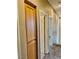 Hallway with carpet and neutral walls, with additional storage space at 7513 Brisa Del Mar Ave, Las Vegas, NV 89179