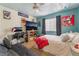 Bright bedroom with wood-style floors, modern decor and comfortable furnishings at 7517 Elk Meadows Ct, Las Vegas, NV 89131