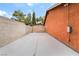 Long driveway leading to a secure gate, offering ample parking space at 7517 Elk Meadows Ct, Las Vegas, NV 89131