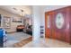 Welcoming entryway with decorative double doors leading into a cozy living space at 7517 Elk Meadows Ct, Las Vegas, NV 89131