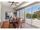 Breakfast nook featuring pool views, outdoor access, neutral paint and comfortable seating for four at 7914 Elk Mountain St, Las Vegas, NV 89113