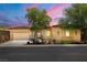 Charming single-story home featuring a well-manicured front yard and neutral stucco exterior in a gated community at 7914 Elk Mountain St, Las Vegas, NV 89113