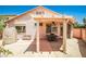Backyard patio area with a covered pergola, outdoor seating, and an outdoor storage container at 7929 Palace Monaco Ave, Las Vegas, NV 89117