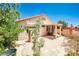Backyard featuring a patio with seating, a covered patio, and partial privacy wall at 7929 Palace Monaco Ave, Las Vegas, NV 89117