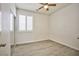 Bedroom featuring wood flooring and window shutters at 7929 Palace Monaco Ave, Las Vegas, NV 89117
