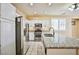 Modern kitchen featuring granite countertops, stainless steel appliances and an island at 7929 Palace Monaco Ave, Las Vegas, NV 89117