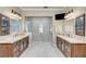 Stunning bathroom with dual sinks, marble counters, and a glass-enclosed shower at 8574 Verde Park Cir, Las Vegas, NV 89129