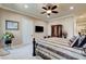 Bright bedroom featuring neutral walls, plush carpet, and cozy bedding at 8574 Verde Park Cir, Las Vegas, NV 89129