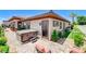 A house exterior featuring a hot tub and well manicured front yard at 8574 Verde Park Cir, Las Vegas, NV 89129