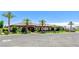 Beautiful single-story home with a tile roof and mature landscaping at 8574 Verde Park Cir, Las Vegas, NV 89129