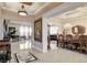 Elegant foyer showcasing marble flooring, high ceilings, and formal dining area at 8574 Verde Park Cir, Las Vegas, NV 89129