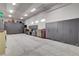 Spacious garage featuring ample storage cabinets, and a work station at 8574 Verde Park Cir, Las Vegas, NV 89129