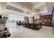Gourmet kitchen featuring a large island with bar seating, modern appliances, and custom cabinetry at 8574 Verde Park Cir, Las Vegas, NV 89129