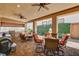 Inviting outdoor kitchen with grill, dining seating, and privacy at 8574 Verde Park Cir, Las Vegas, NV 89129