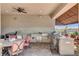 Outdoor kitchen featuring a built-in BBQ grill, bar, and dining area at 8574 Verde Park Cir, Las Vegas, NV 89129