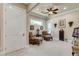 Sitting room includes comfortable seating, natural light, and refined décor at 8574 Verde Park Cir, Las Vegas, NV 89129