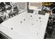 Close up shot of a jacuzzi tub with jets and headrests surrounded by marble paneling at 8955 Ruby Moon Dr, Las Vegas, NV 89139