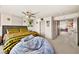 Bedroom with a king bed and access to the upstairs loft at 8955 Ruby Moon Dr, Las Vegas, NV 89139