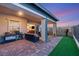 Spacious covered patio with grill and outdoor seating, perfect for entertaining at 964 Edinburgh Fields Ct, Las Vegas, NV 89138