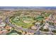 Aerial view of golf course with beautiful landscaping and lush green grass at 9912 Woodhouse Dr, Las Vegas, NV 89134